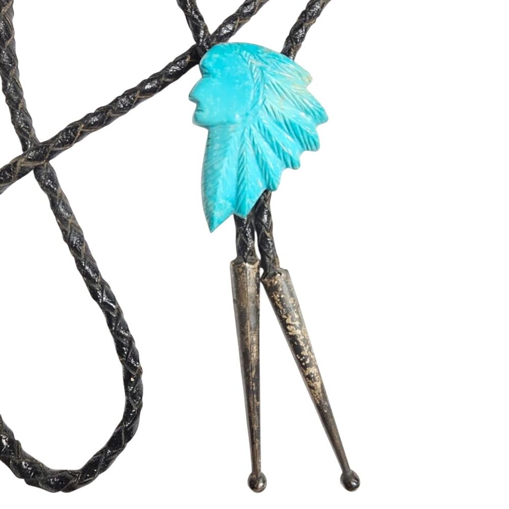 Vintage Carved Chief Stabilized Turquoise Sterling Silver Bolo Tie